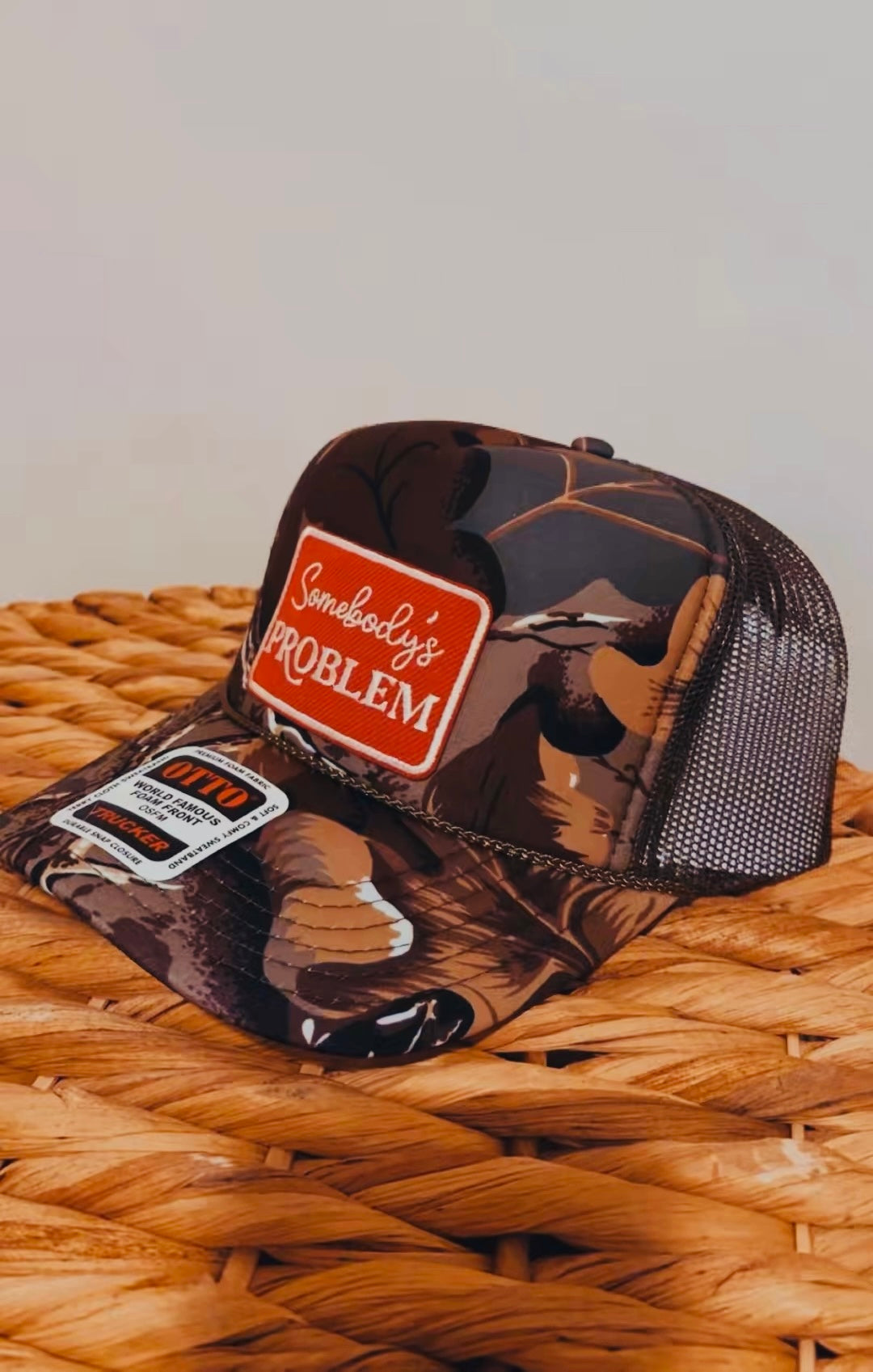 “Somebody’s Problem” Camo OTTO Trucker Hat                        (Pre-Order, 1.5 week tat🫶🏼)