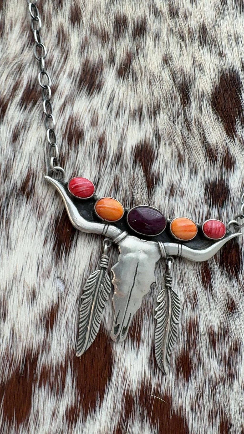 Native Made Multi-Stone Steer Head Necklace: Signed “GRHS” featuring Sterling & red/orange/purple spiny stones (3”x 2”)