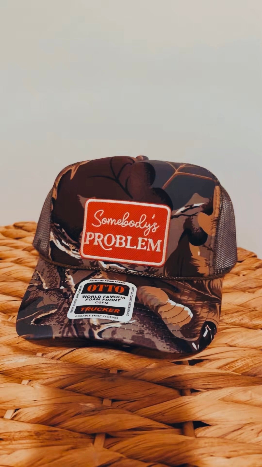 “Somebody’s Problem” Camo OTTO Trucker Hat                        (Pre-Order, 1.5 week tat🫶🏼)